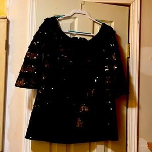 Gala top intact ,dresses up any skirt or pant